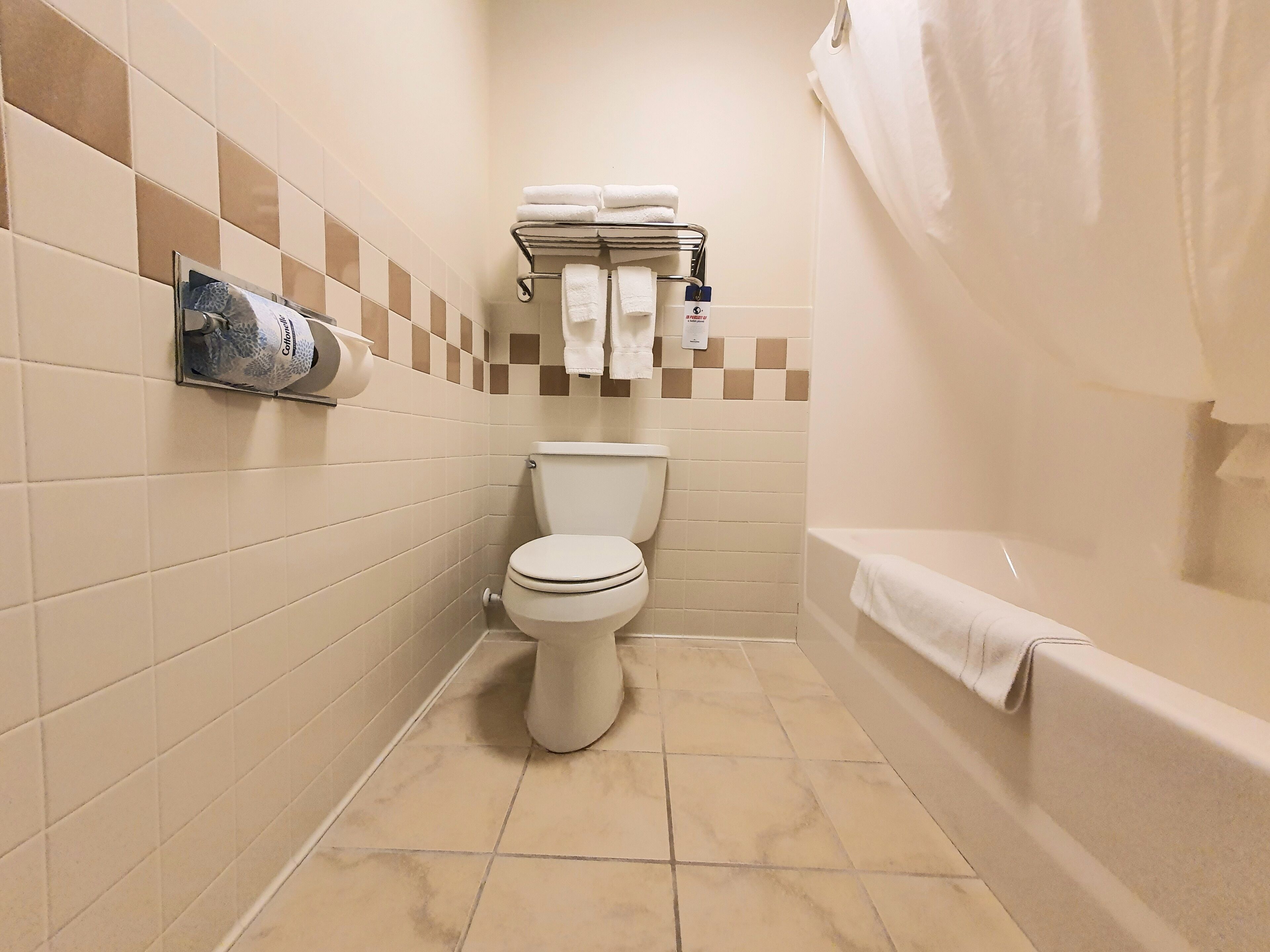 standard room, 2 queen beds, non smoking | bathroom | combined shower/bathtub, designer toiletries, hair dryer, towels