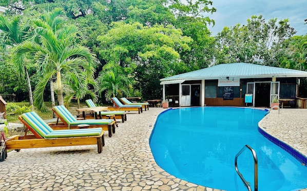 Outdoor pool, open 6:30 AM to 10:00 PM, pool loungers - Black Orchid Resort (Burrell Boom)