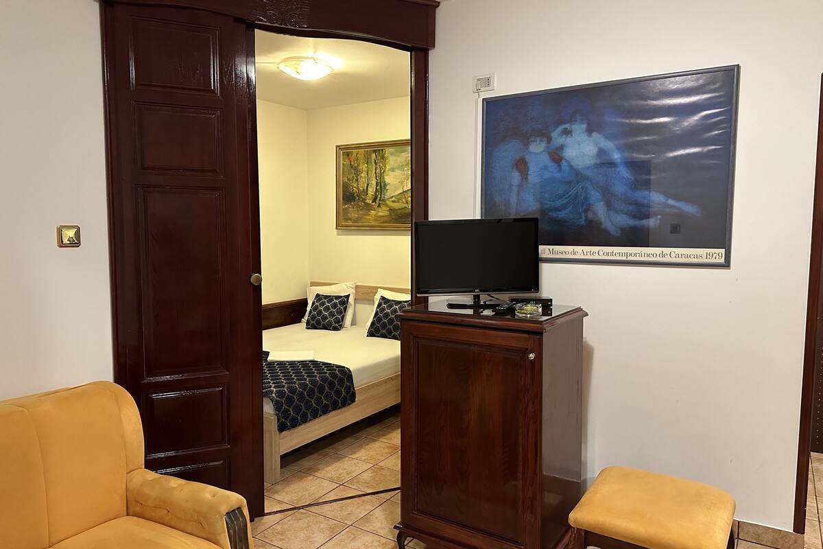 quadruple room, balcony, city view | in-room safe, individually decorated, soundproofing, iron/ironing board