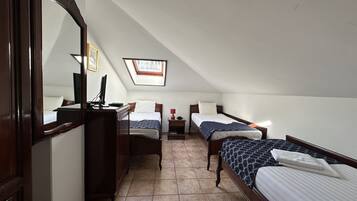 Classic Triple Room, City View | 1 bedroom, in-room safe, individually decorated, soundproofing