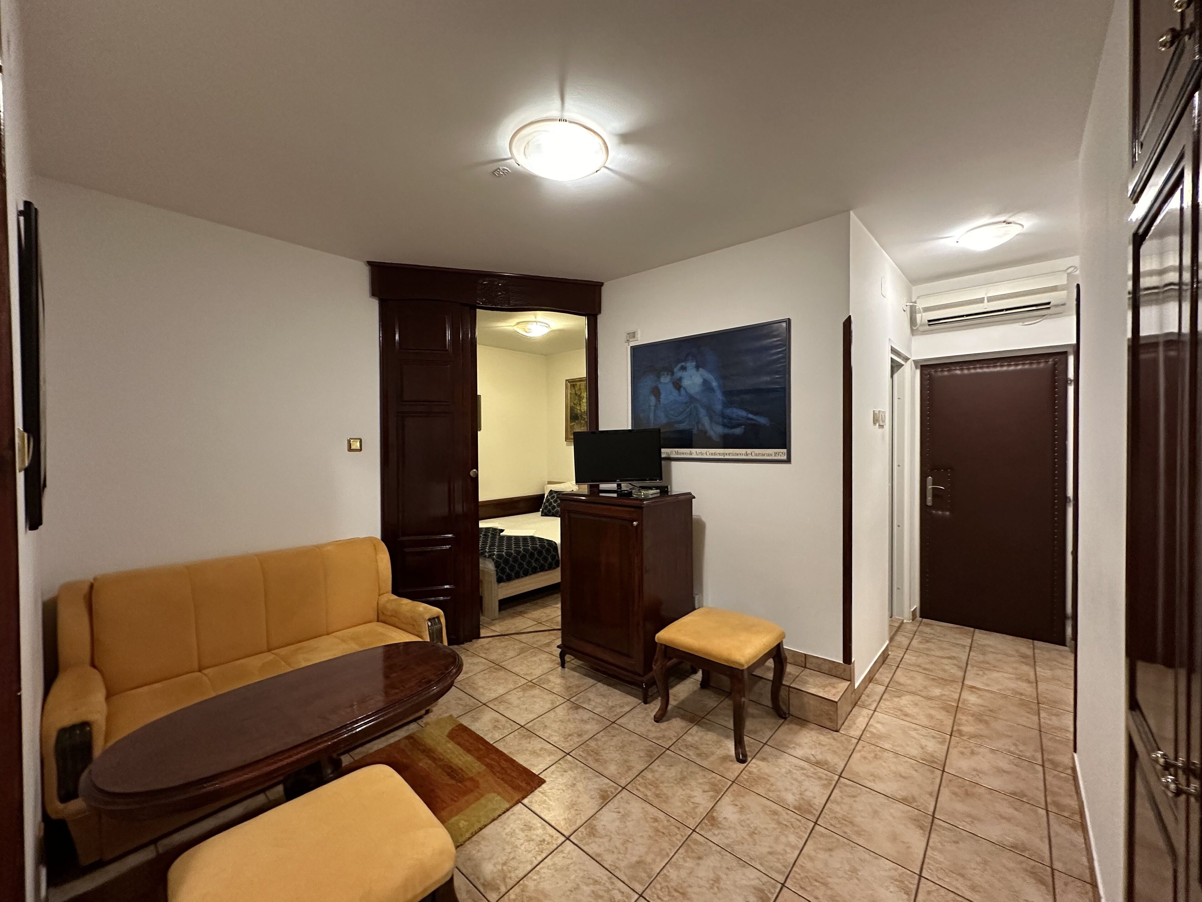 quadruple room, balcony, city view | in-room safe, individually decorated, soundproofing, iron/ironing board