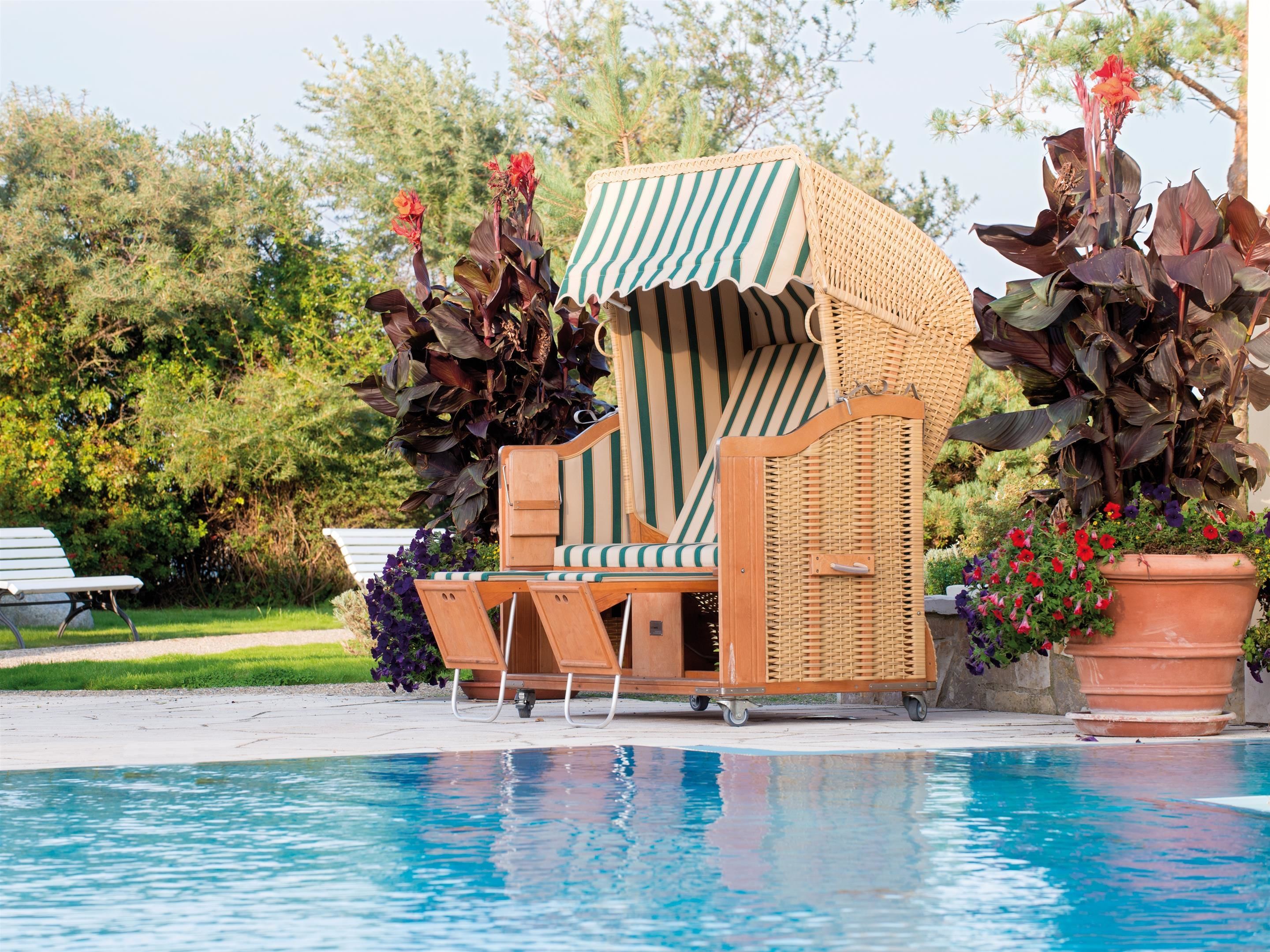 indoor pool, outdoor pool, open 7:00 am to 9:00 pm, pool umbrellas