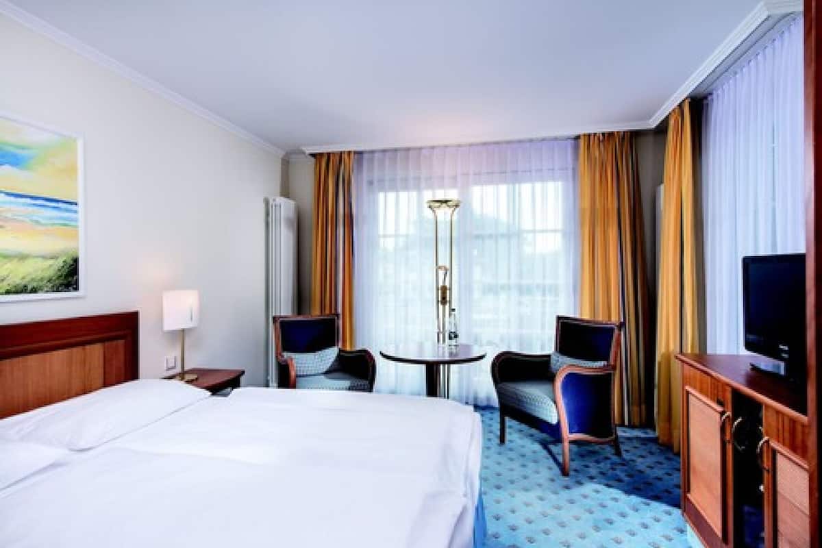 hypo-allergenic bedding, minibar, in-room safe, blackout curtains