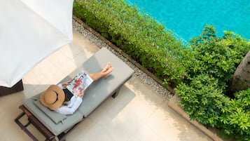 Outdoor pool, open 6:00 AM to 10:00 PM, pool umbrellas, sun loungers