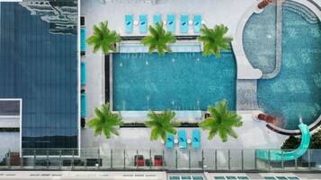 Outdoor pool, open 6:00 AM to 10:00 PM, pool umbrellas, pool loungers