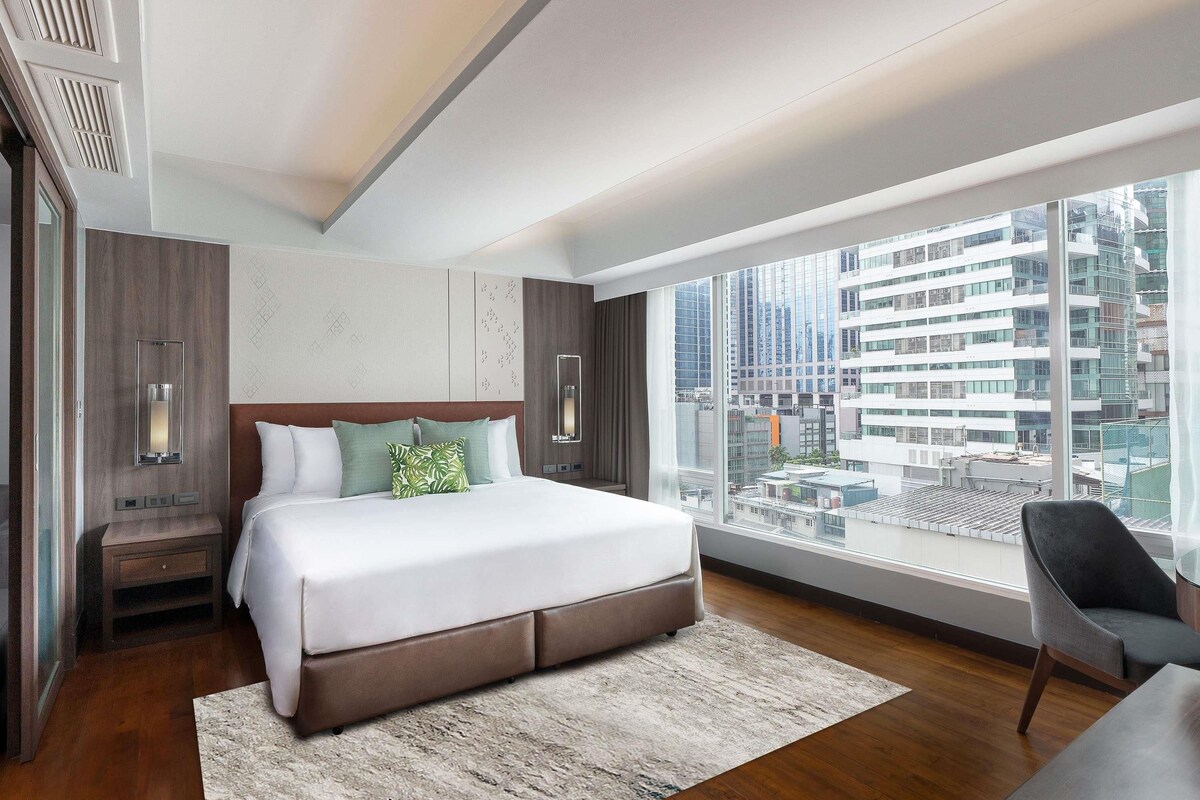Premium bedding, pillow-top beds, free minibar items, in-room safe