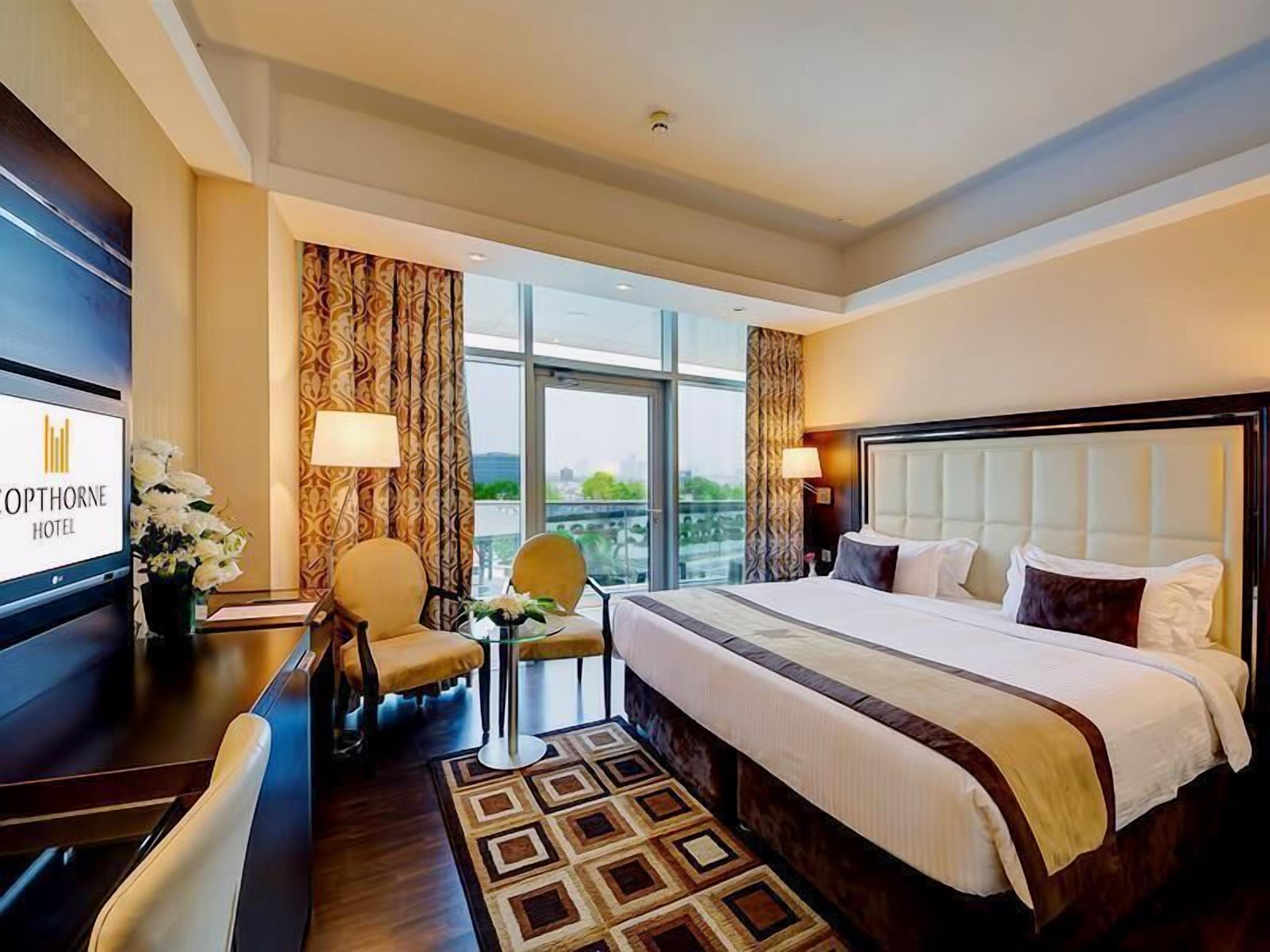 Hypo-allergenic bedding, minibar, in-room safe, desk