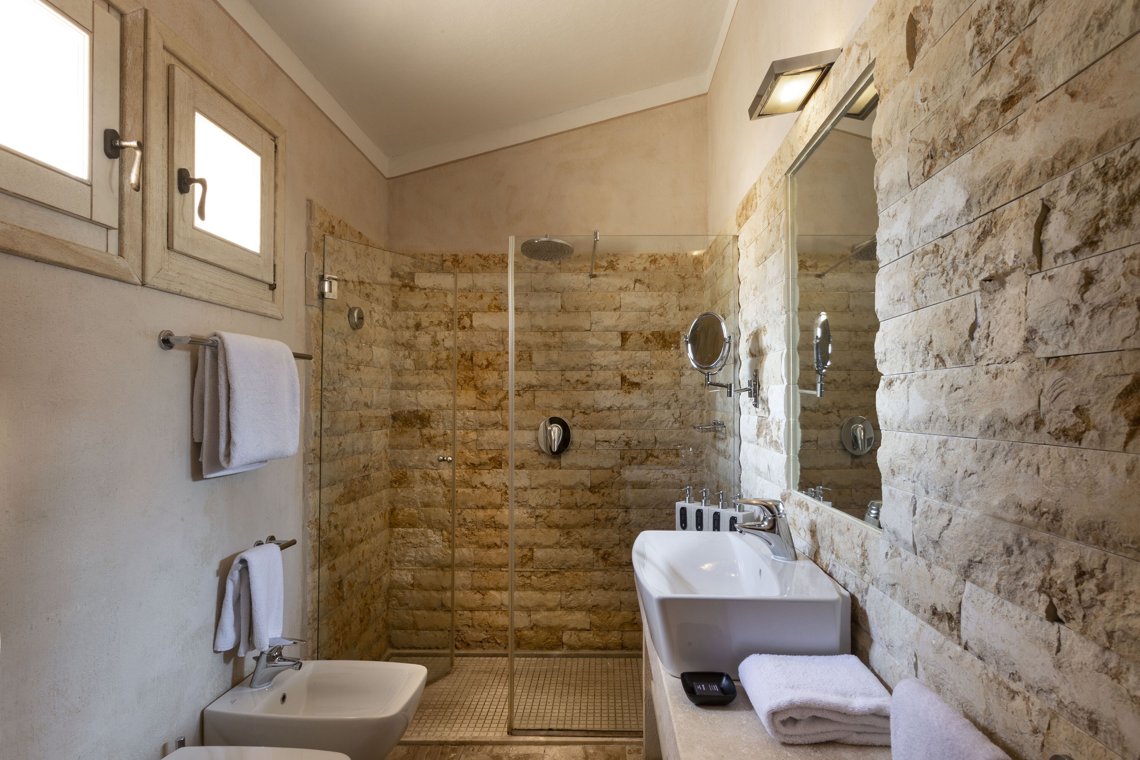 designer toiletries, hair dryer, bathrobes, slippers