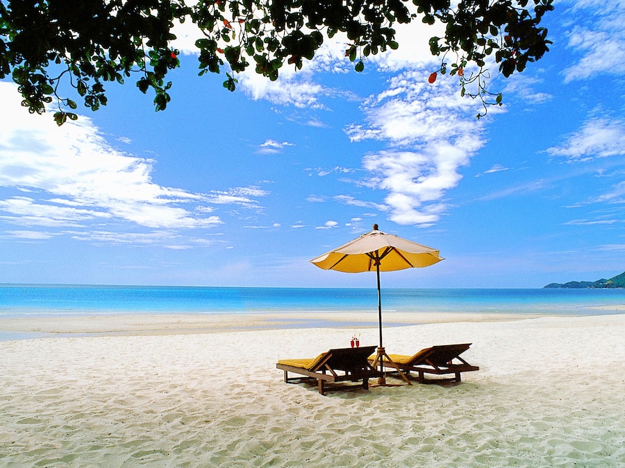 On the beach, beach umbrellas, beach towels, beach bar