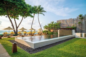 Outdoor pool, open 7:00 AM to 7:00 PM, pool umbrellas, sun loungers