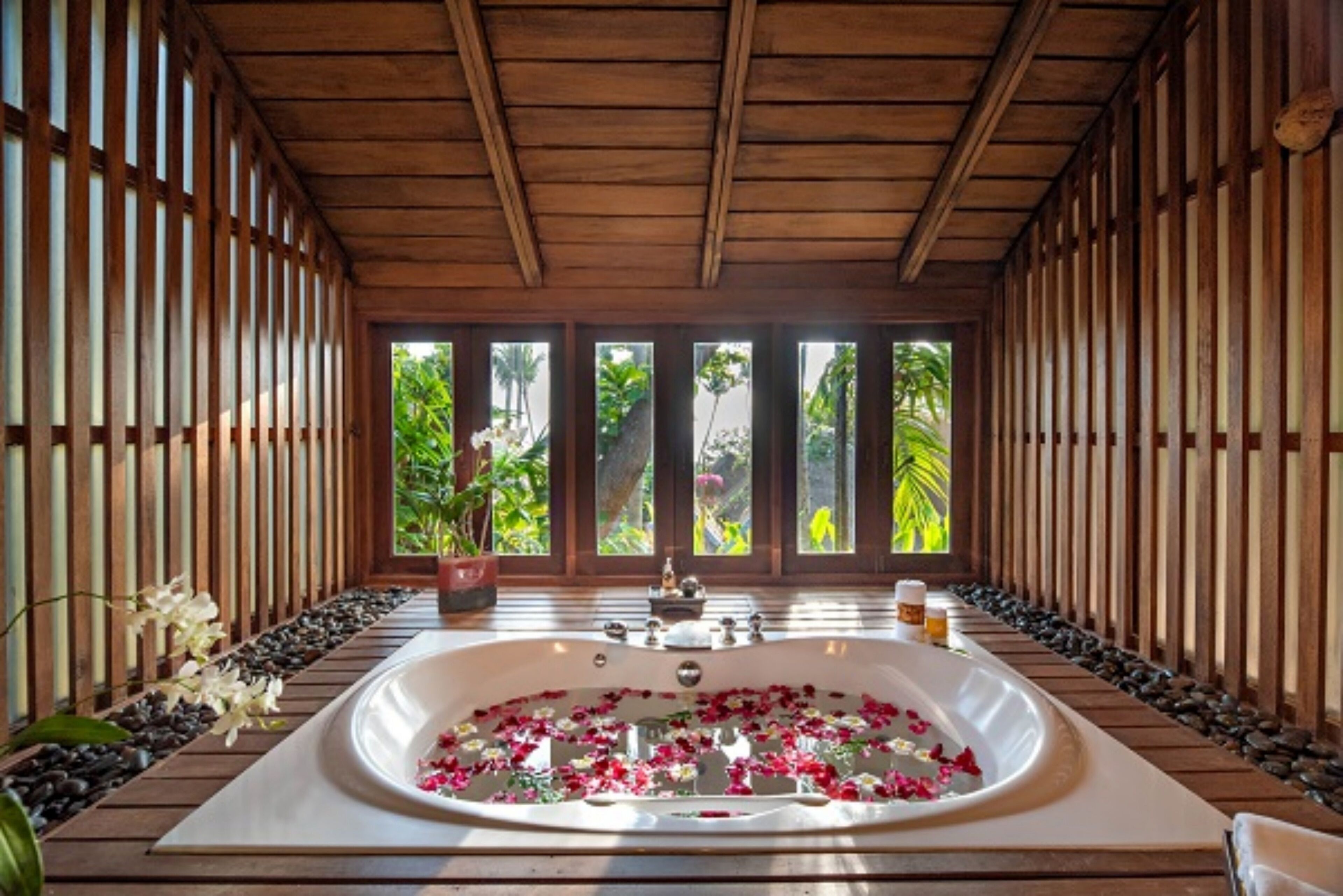 boutique ocean escape | bathroom | designer toiletries, hair dryer, bathrobes, slippers