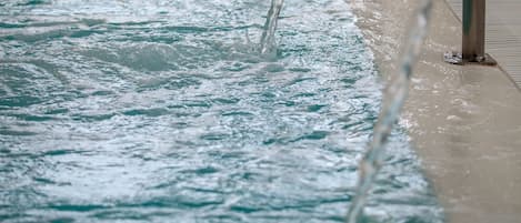 Seasonal outdoor pool, lifeguards on site