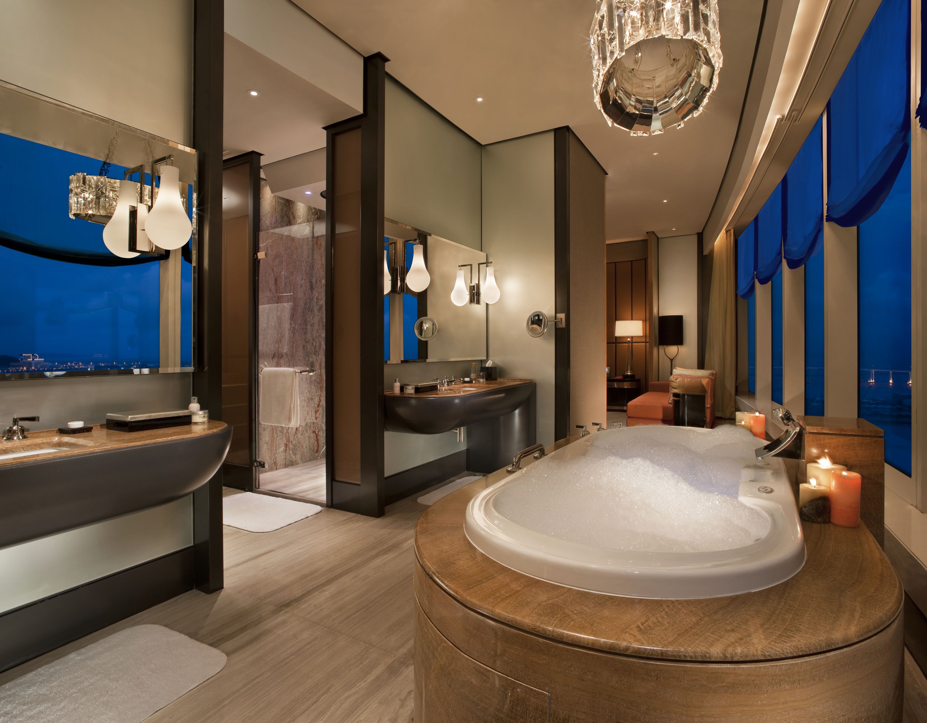 separate bathtub and shower, rainfall showerhead, designer toiletries