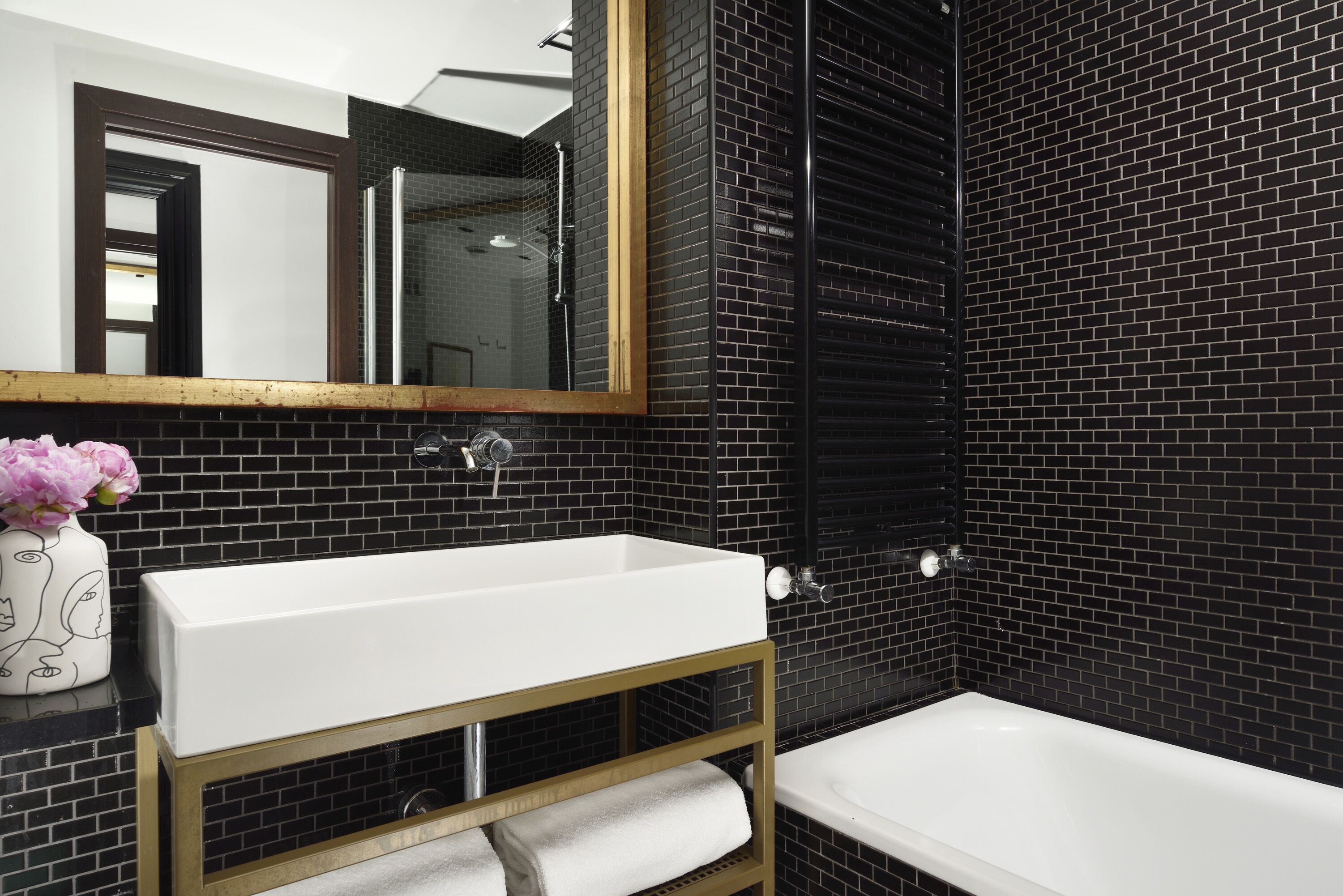 combined shower/bathtub, free toiletries, hair dryer, slippers