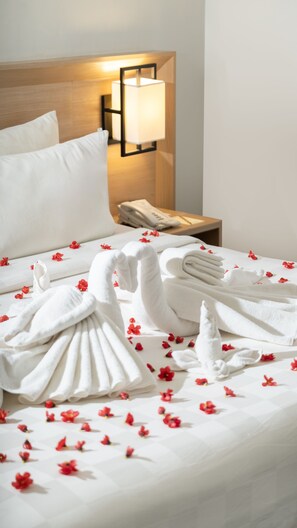 Ropa de cama de alta calidad, minibar, caja fuerte y escritorio