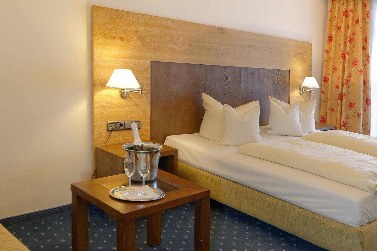 deluxe double room | hypo-allergenic bedding, down duvets, in-room safe, desk