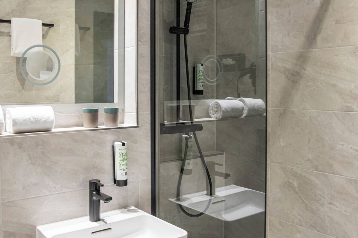 shower, hair dryer, towels