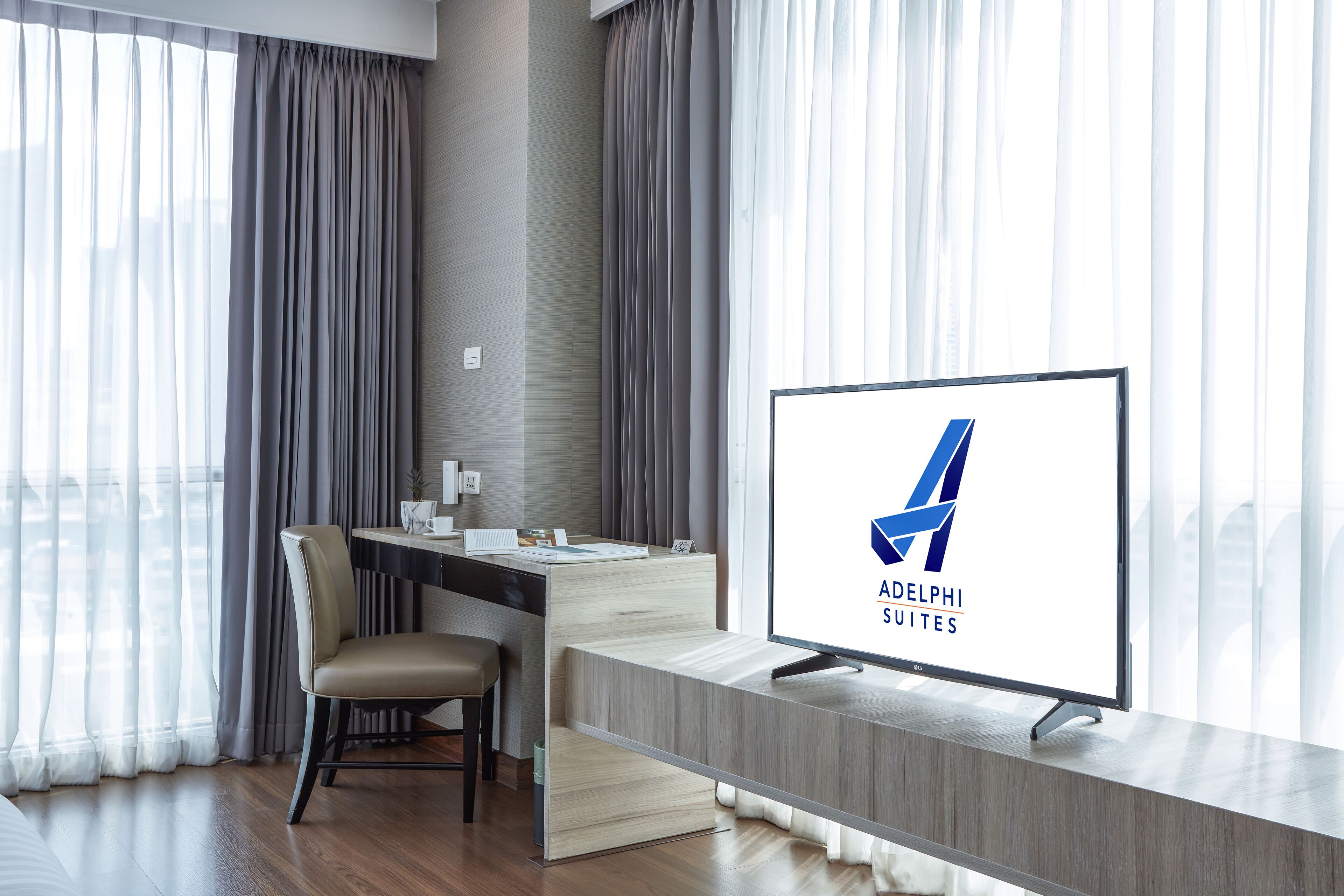 studio twin room | in-room safe, desk, laptop workspace, blackout curtains