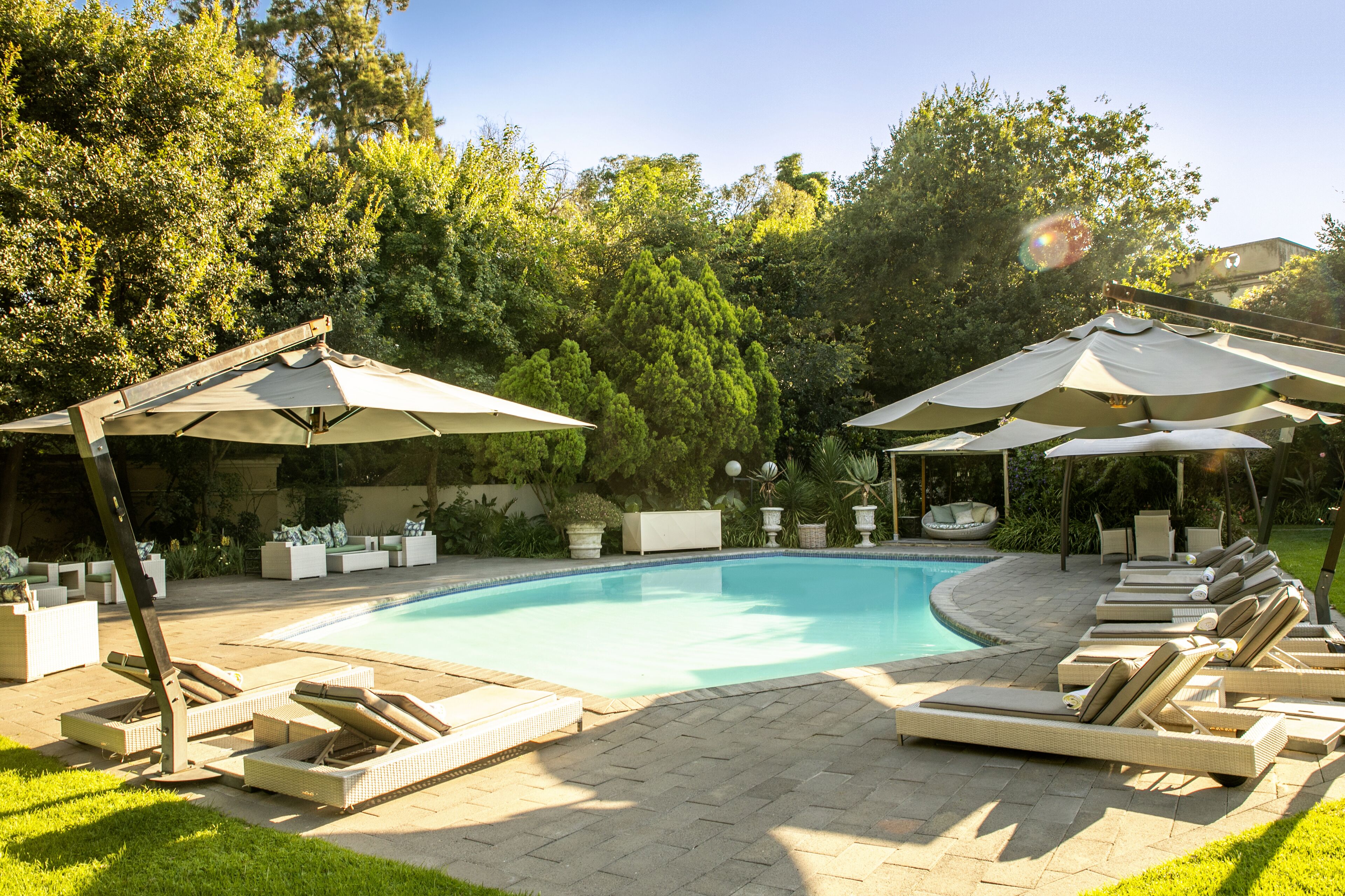 Outdoor pool, pool umbrellas, pool loungers