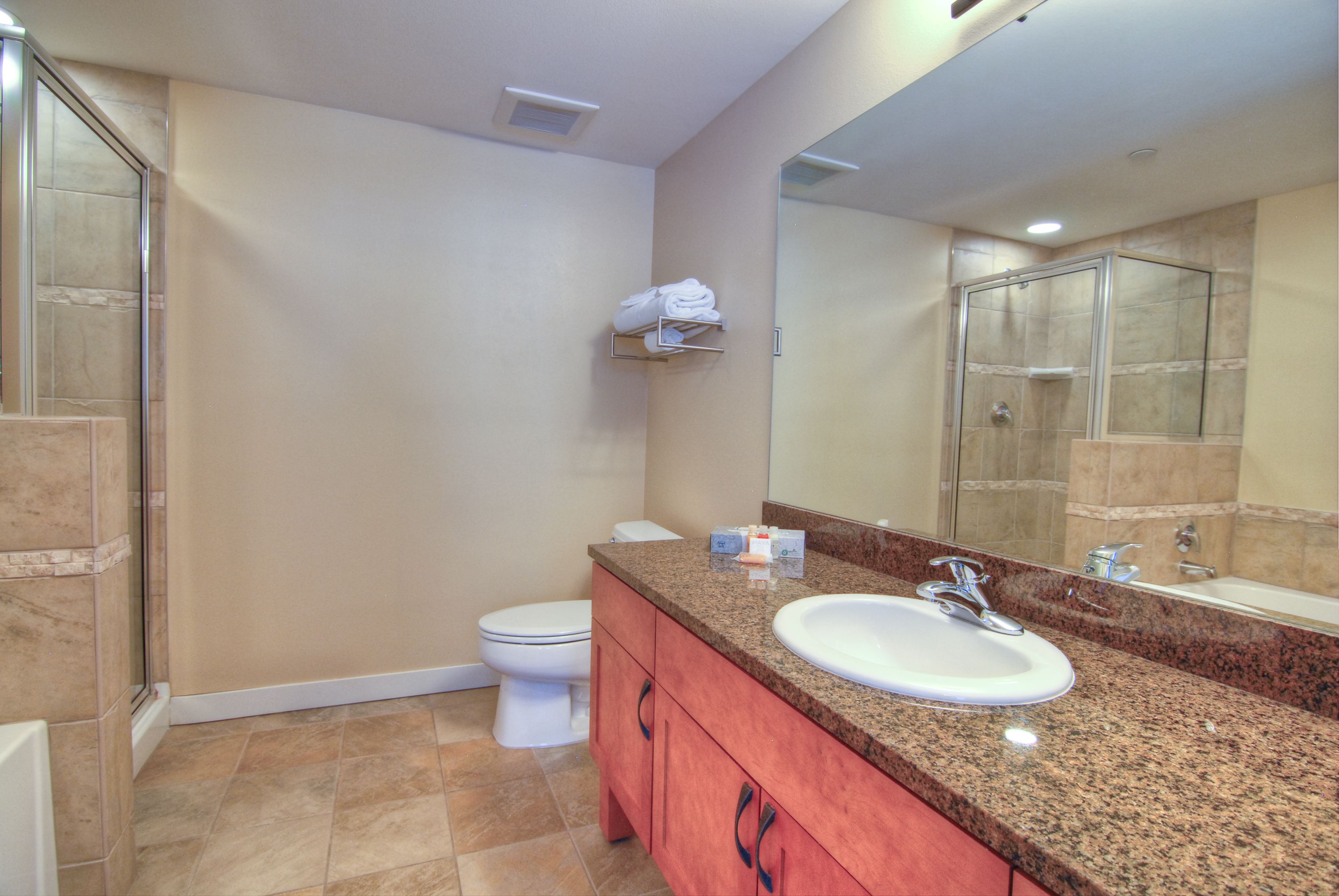 2 bedroom gold | bathroom | hair dryer, towels