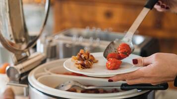 Daily buffet breakfast (EUR 15 per person)