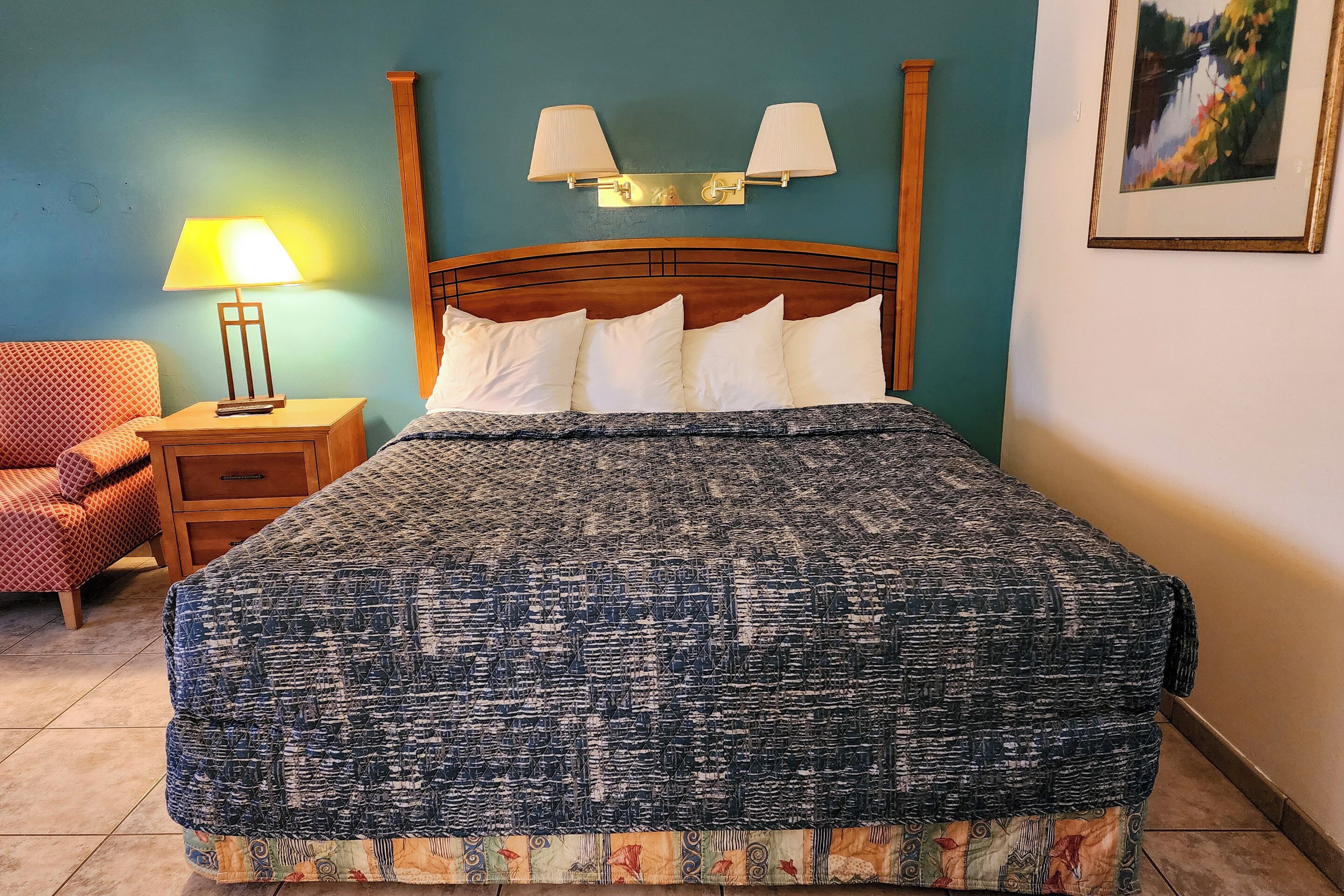 room, 1 king bed, refrigerator & microwave, courtyard area | blackout curtains, iron/ironing board, free wifi, bed sheets