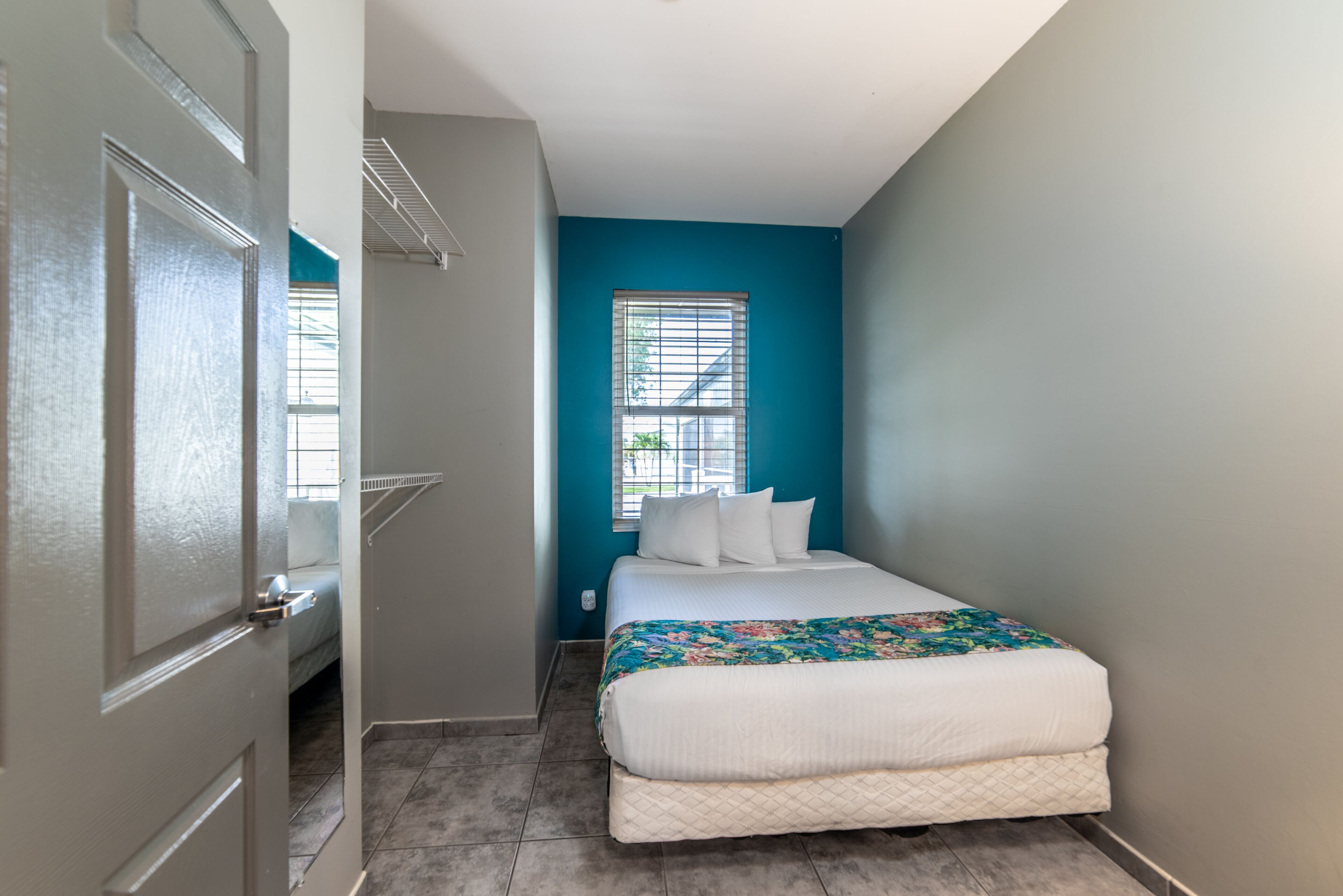 deluxe room, 2 queen beds, refrigerator & microwave | blackout curtains, iron/ironing board, free wifi, bed sheets