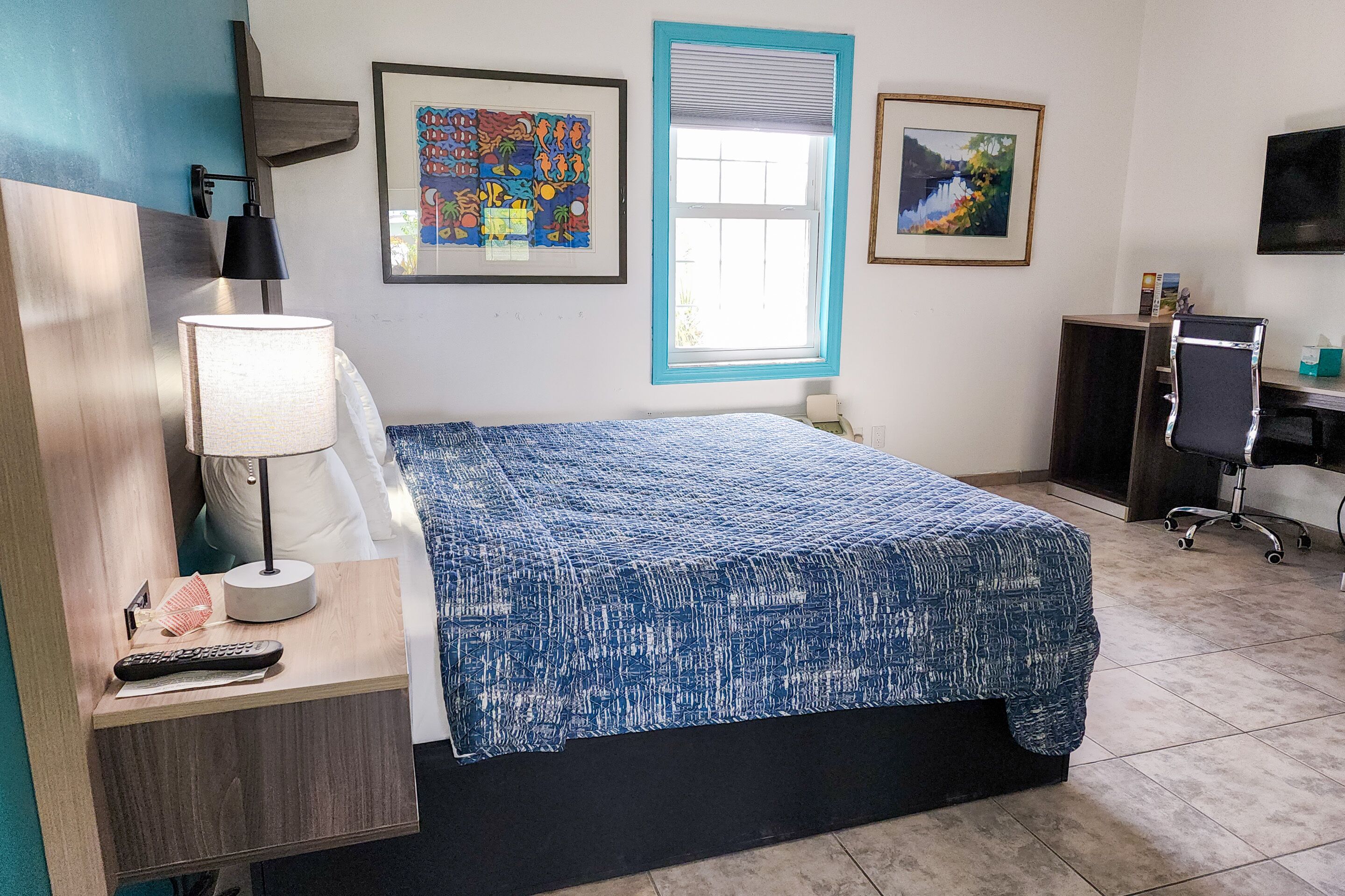 basic room, 1 king bed, refrigerator & microwave | blackout curtains, iron/ironing board, free wifi, bed sheets