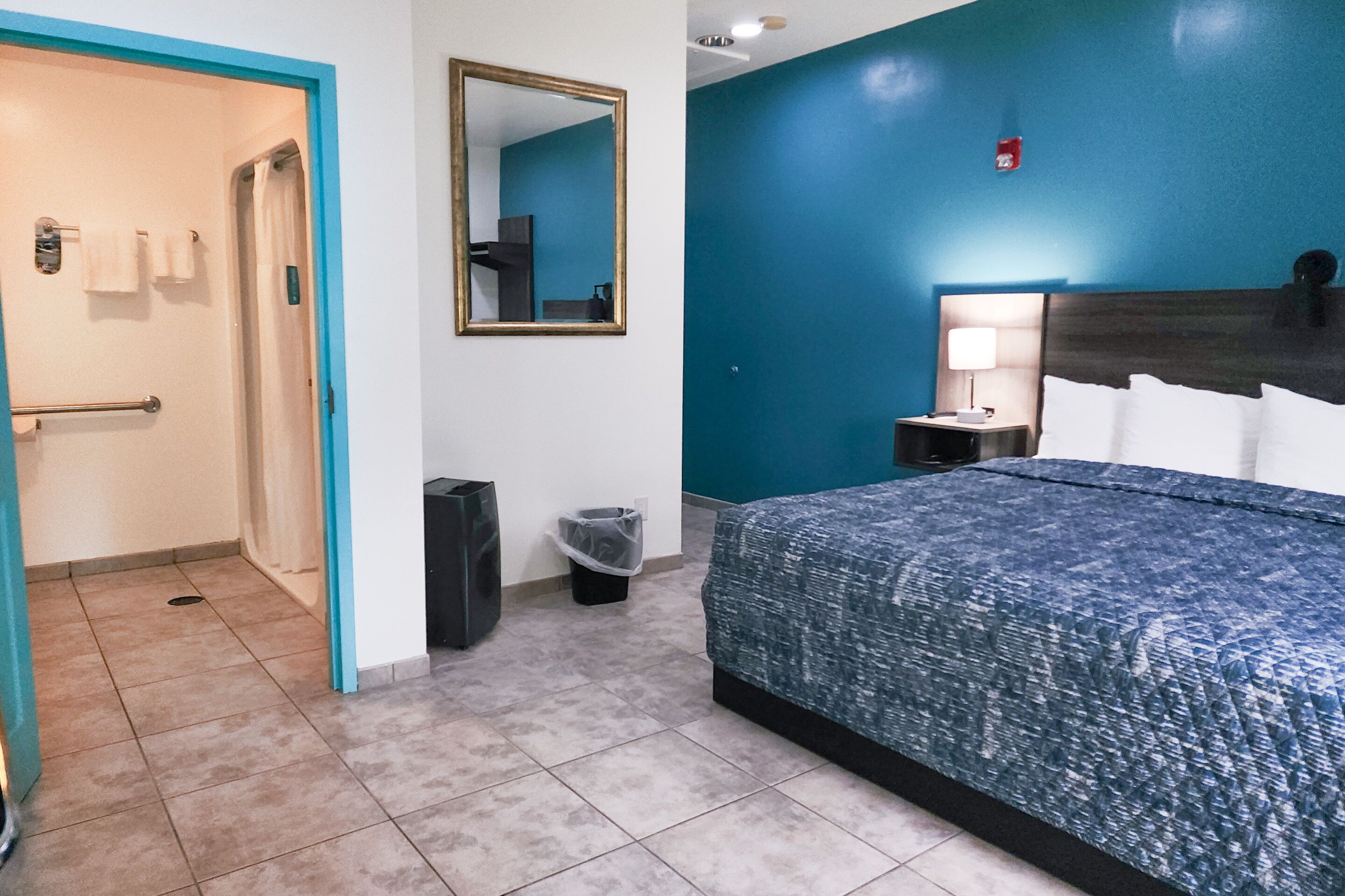 basic room, 1 king bed, refrigerator & microwave | blackout curtains, iron/ironing board, free wifi, bed sheets