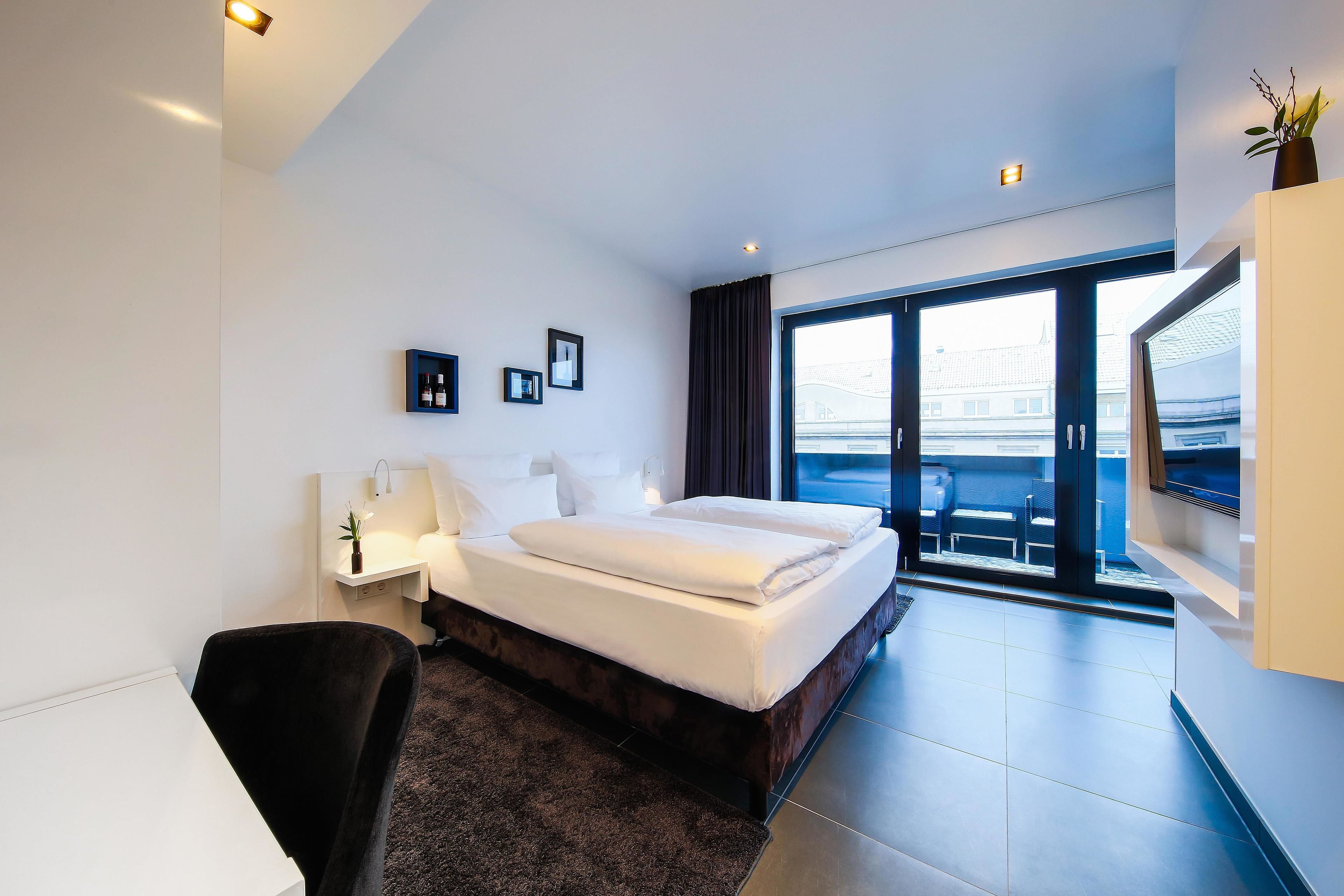 Hochwertige Bettwaren, Zimmersafe, Schreibtisch