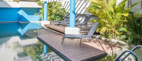 Outdoor pool, a heated pool, open 8:00 AM to 8:00 PM, sun loungers