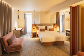 Hypoallergeen beddengoed, een minibar, een kluis op de kamer, een bureau