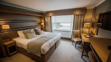 Premium bedding, down comforters, in-room safe, desk