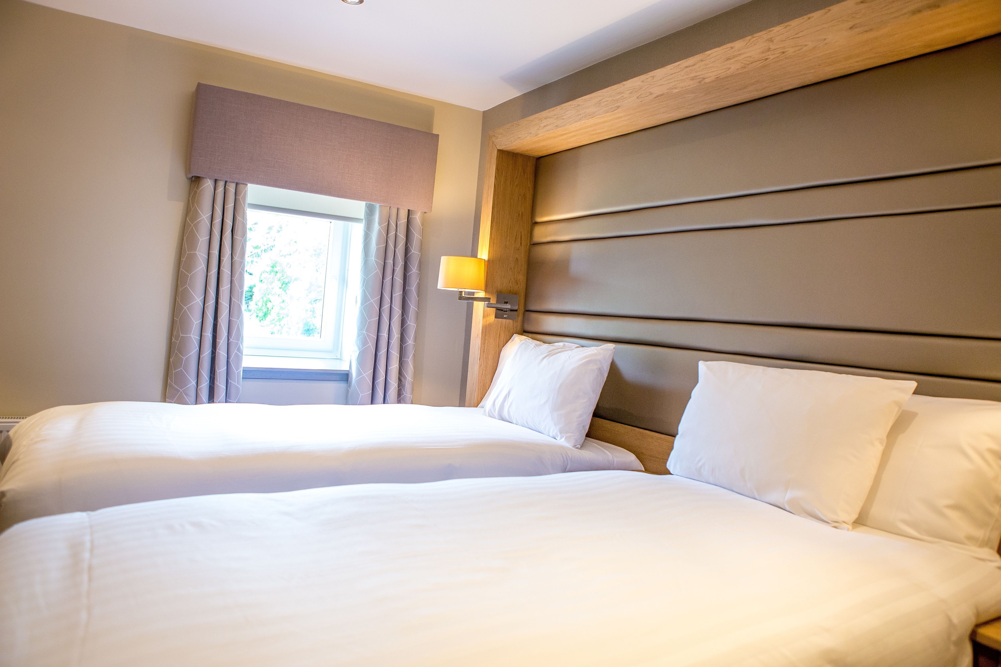 Premium bedding, down duvets, in-room safe, desk