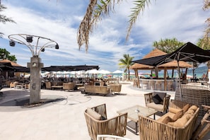 On the beach, sun-loungers, beach umbrellas