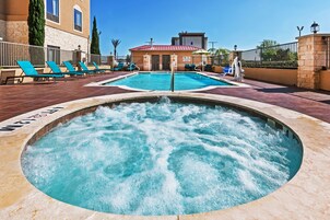 Outdoor pool, open 10 AM to 10 PM, sun loungers