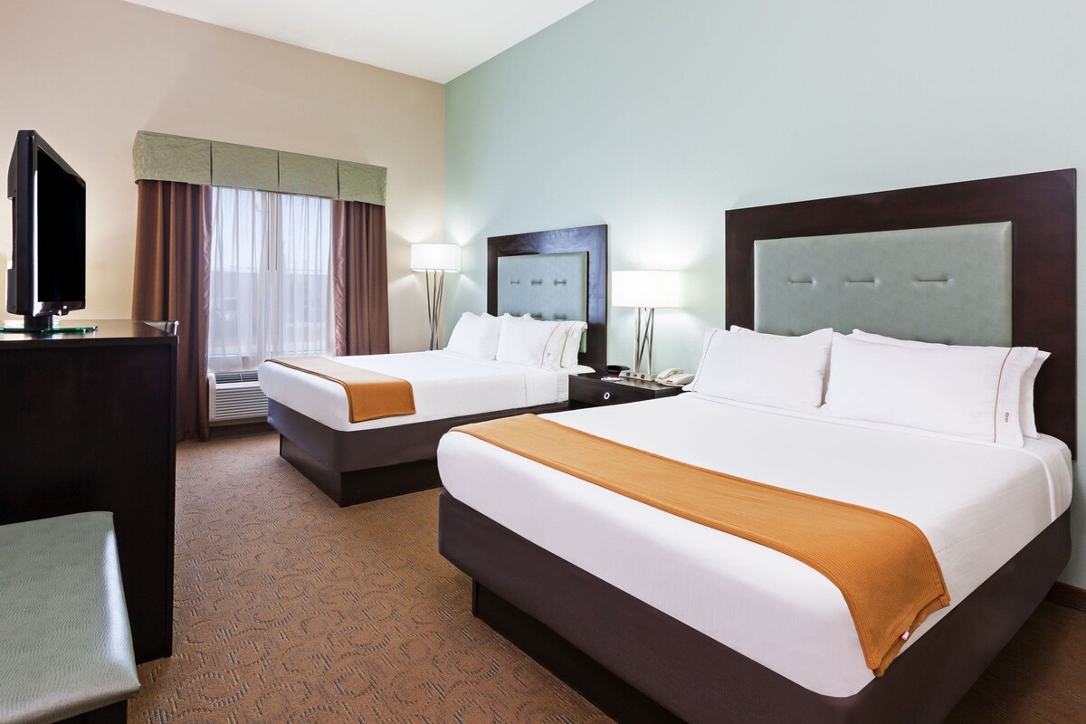 Premium bedding, desk, laptop workspace, iron/ironing board