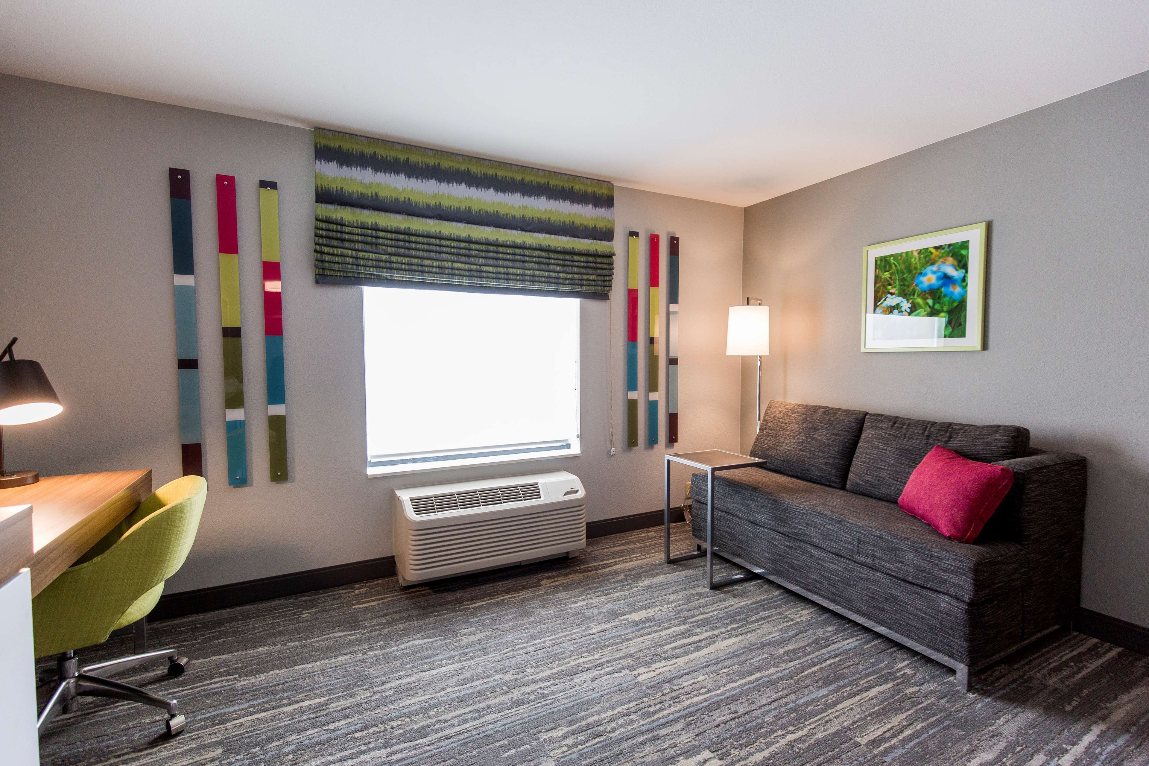 hypo-allergenic bedding, pillow-top beds, desk, laptop workspace