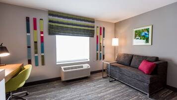 Hypo-allergenic bedding, pillow-top beds, desk, laptop workspace