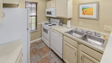 Villa, 2 Bedrooms (Lodge, 1 King & 1 Queen Bed) | Private kitchen | Full-sized fridge, microwave, oven, stovetop
