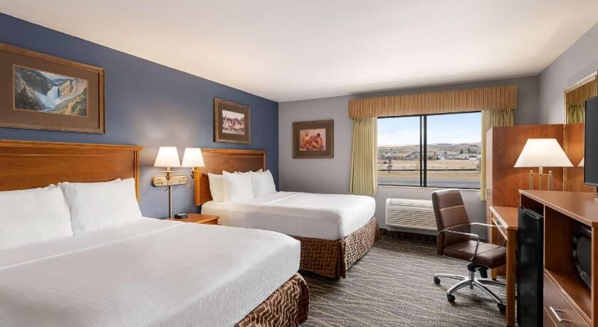 Premium bedding, pillow-top beds, desk, blackout curtains