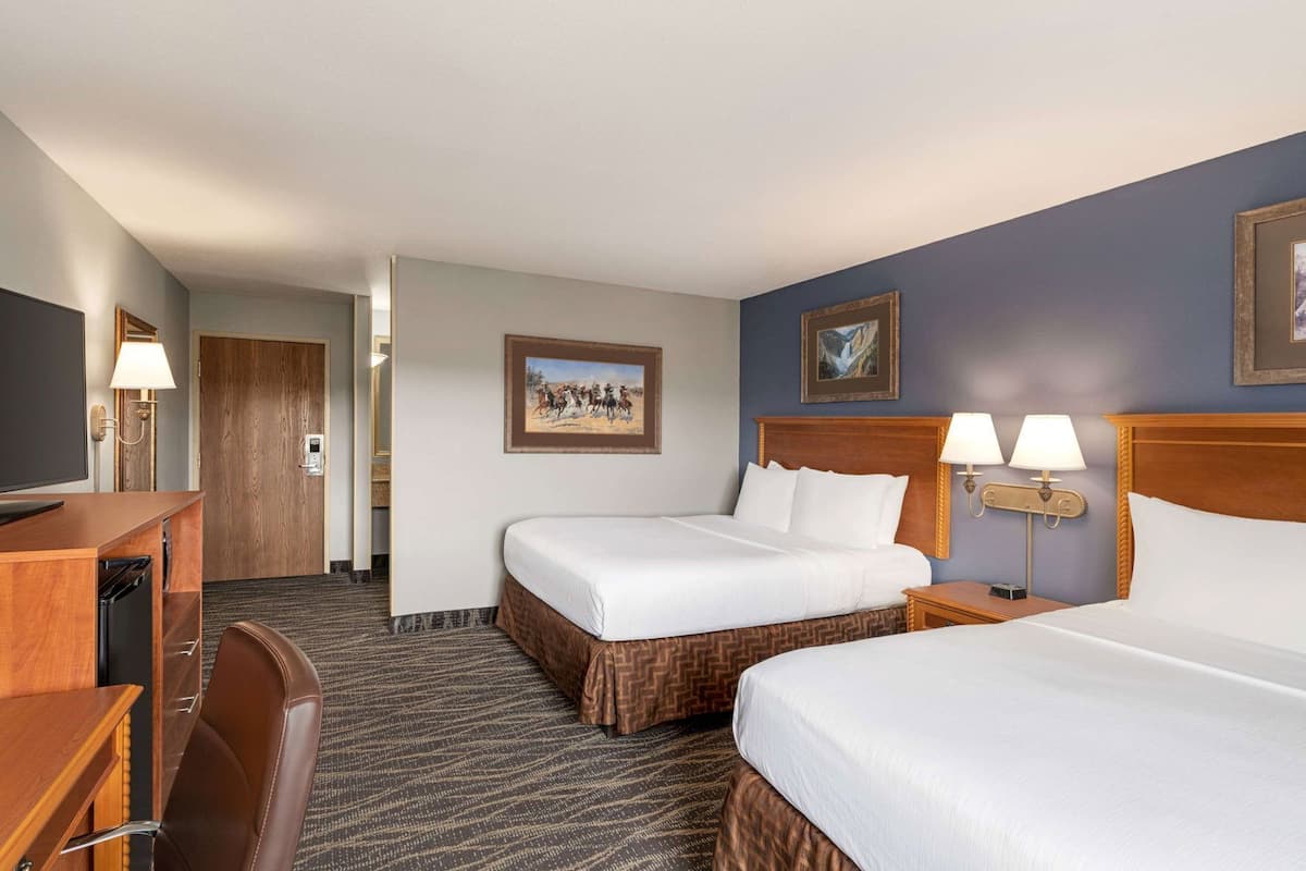 Premium bedding, pillowtop beds, desk, blackout drapes