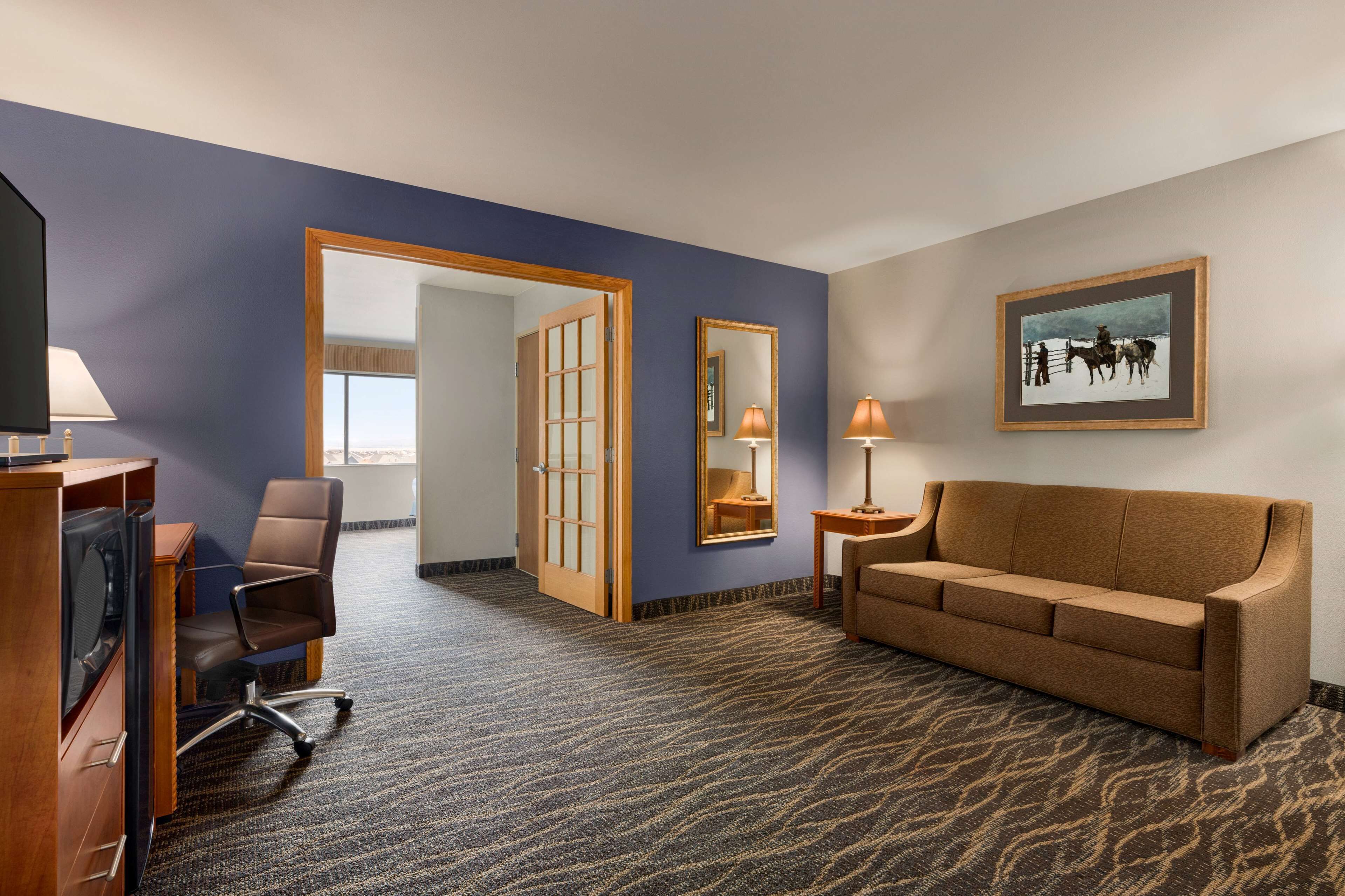 premium bedding, pillow-top beds, desk, blackout curtains