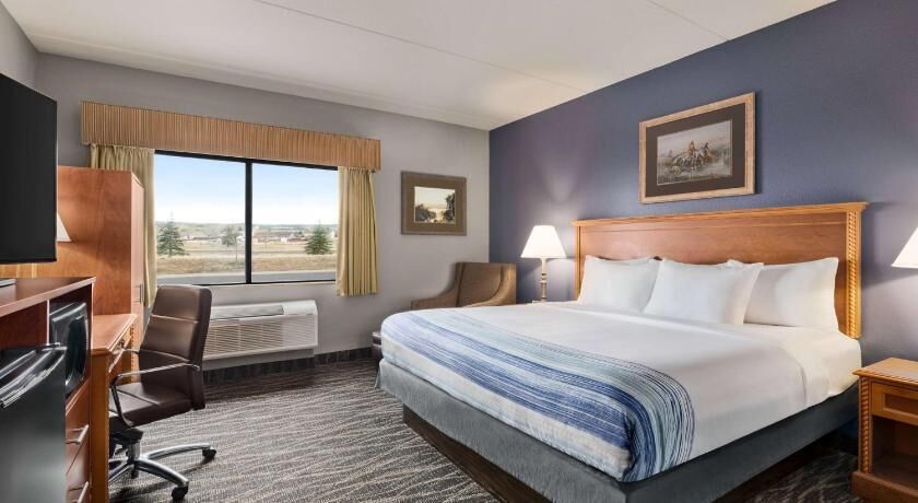Premium bedding, pillow-top beds, desk, blackout curtains