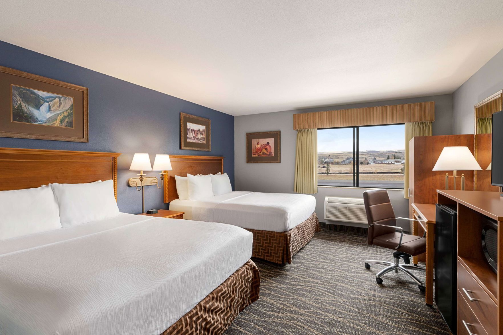 Premium bedding, pillow-top beds, desk, blackout curtains