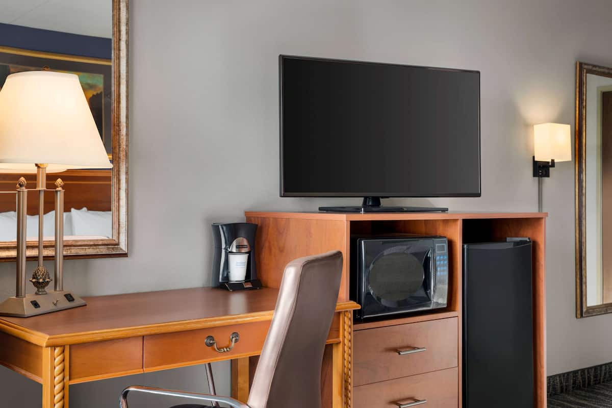 premium bedding, pillow-top beds, desk, blackout curtains