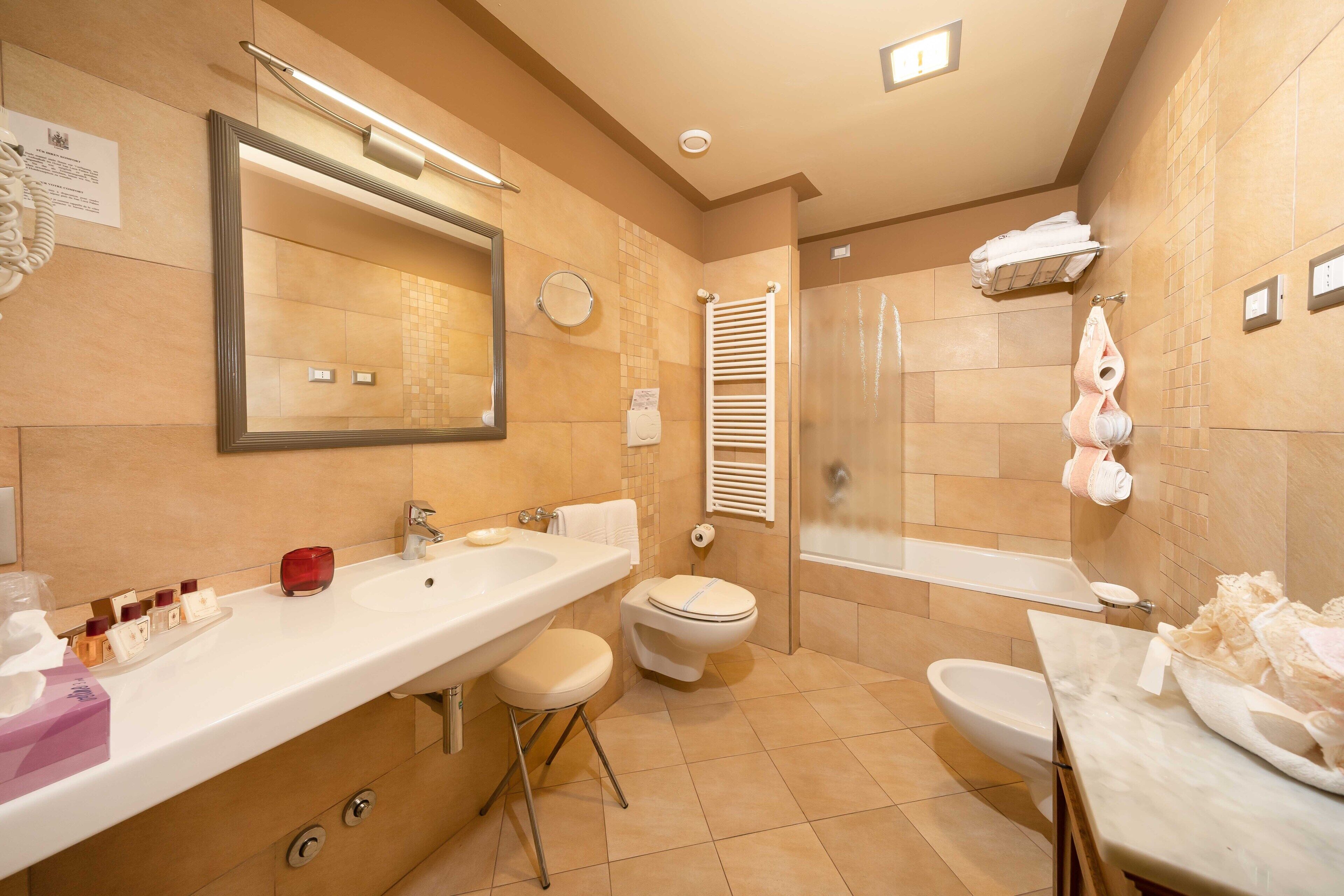 junior suite | bathroom | free toiletries, hair dryer, bathrobes, slippers