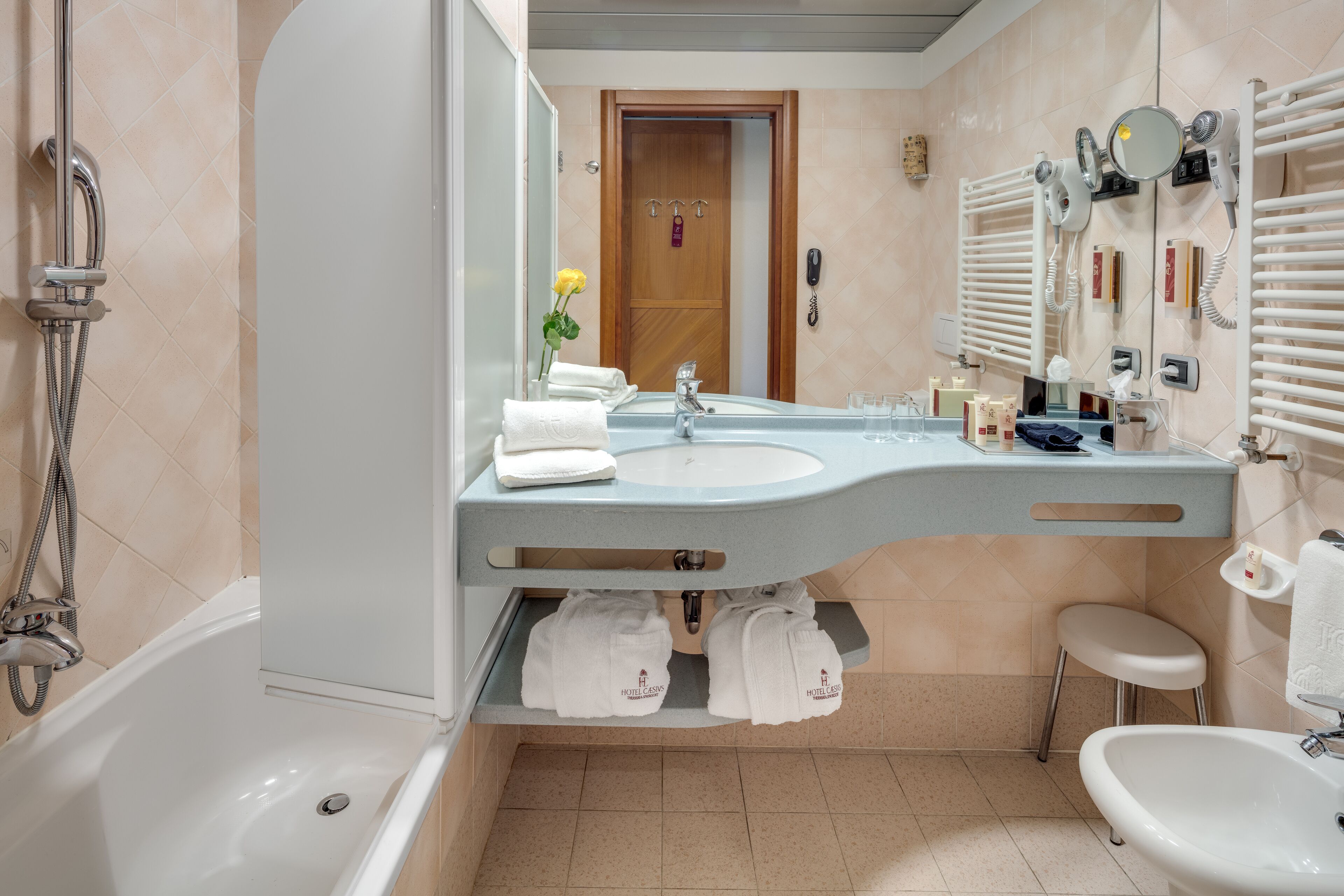 combined shower/bathtub, free toiletries, hair dryer, bathrobes