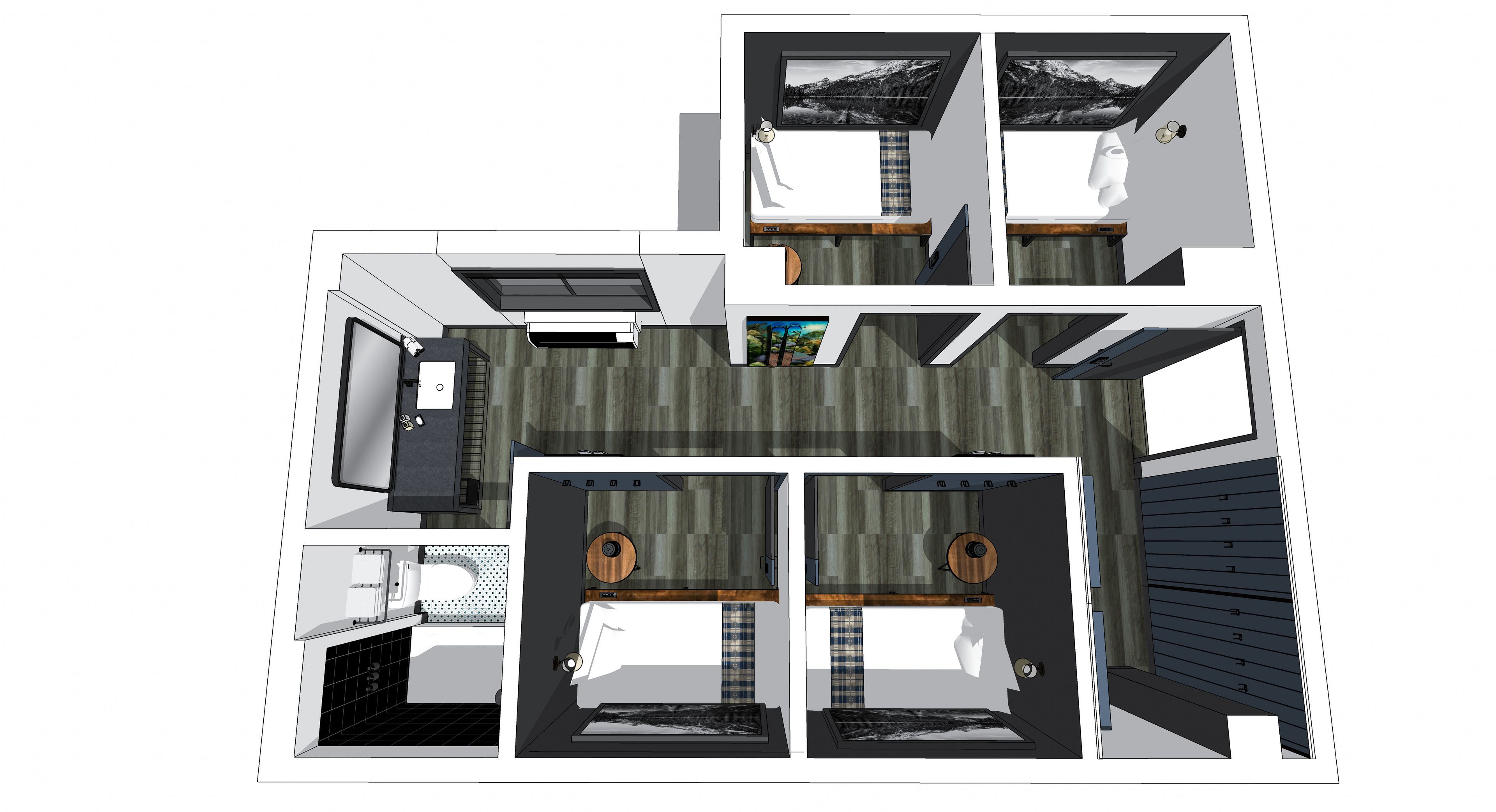 Een tweelaags gebouw met een keuken, eetruimte en twee slaapkamers.