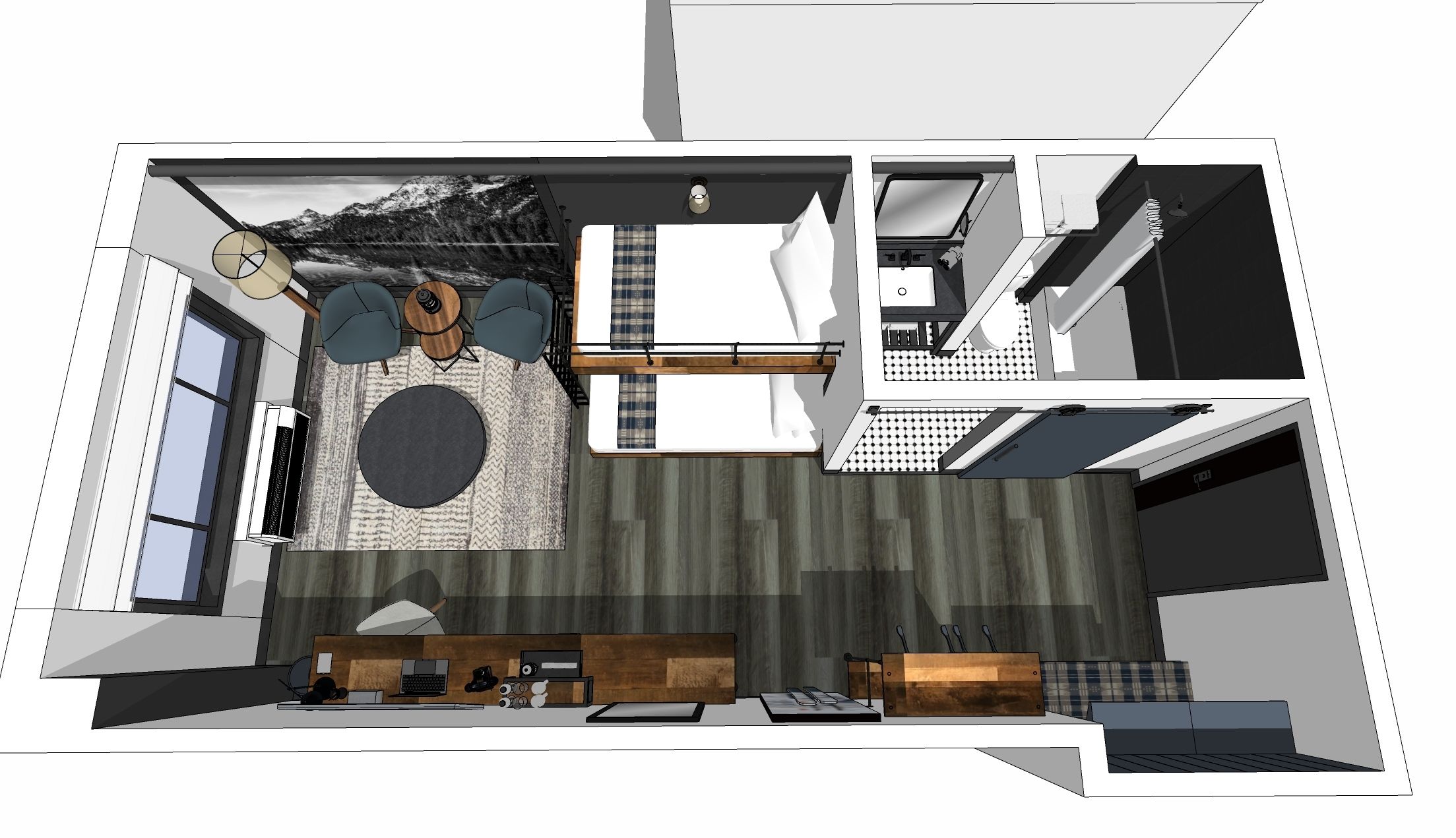 A modern living room with a large round table, two armchairs, a sofa, a TV, and a kitchen area with a dining table and chairs.
